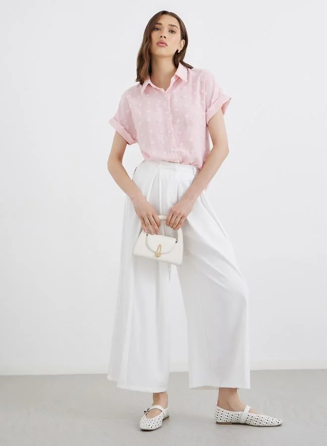 تايك تو قميص نسائي بنقشة النقاط السويسرية باللون الوردي