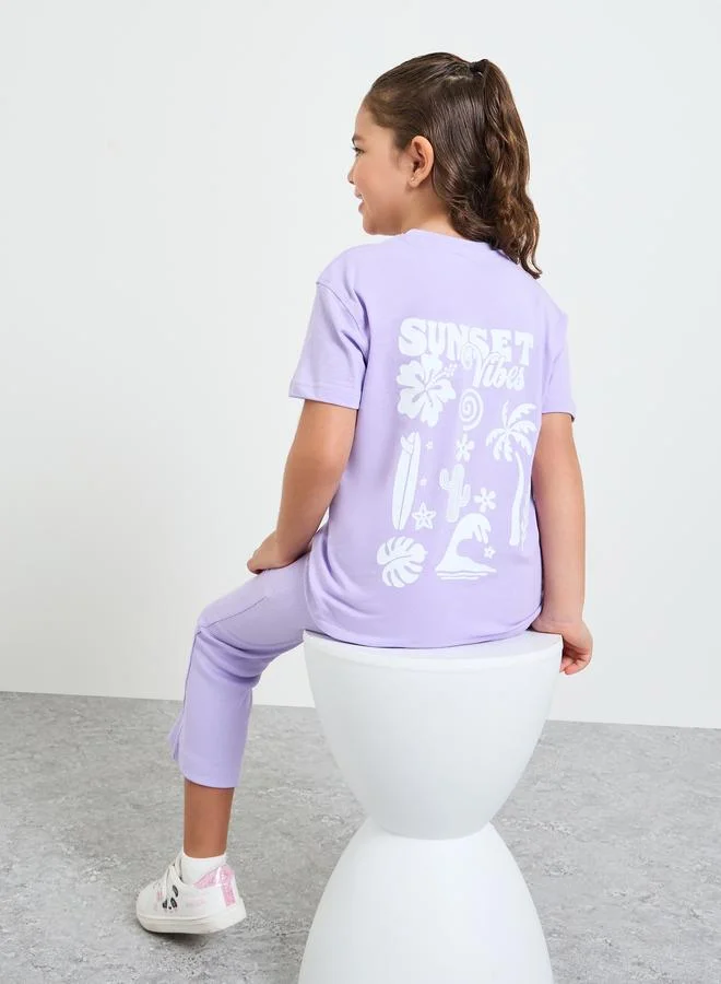 Styli Girls Graphic Print Oversized T-Shirt and Leggings Set