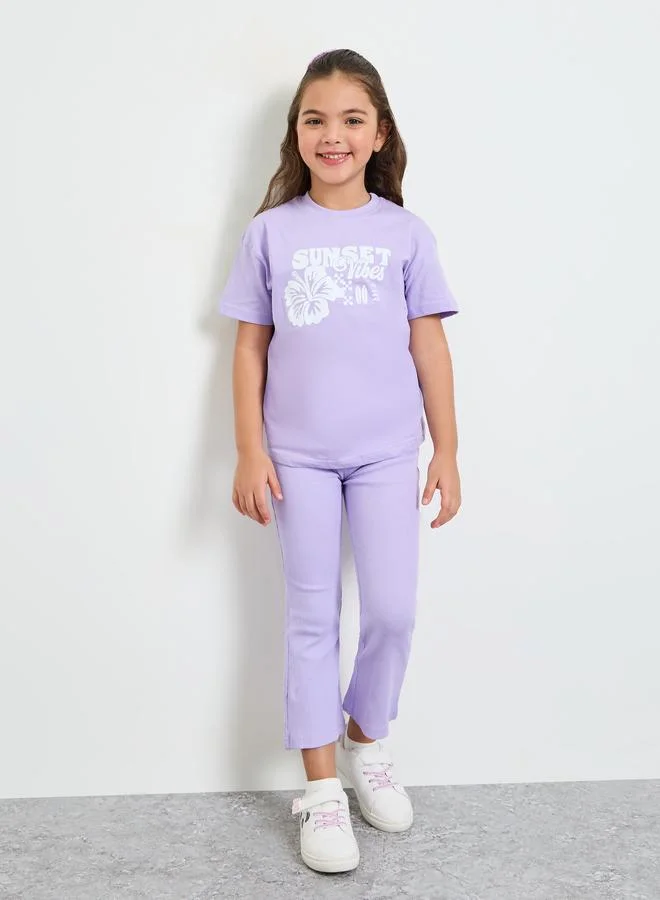 Styli Girls Graphic Print Oversized T-Shirt and Leggings Set