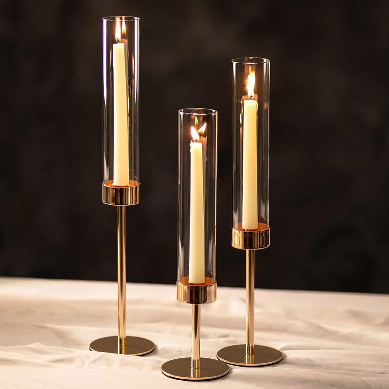 NUPTIO Hurricane Candlestick Holders for Centerpiece: Gold Taper Candles Stick Holders with Clear Glass Chimney - Tall Candleholder Set of 3 for Birthday Party Outdoor Decor - Image 1