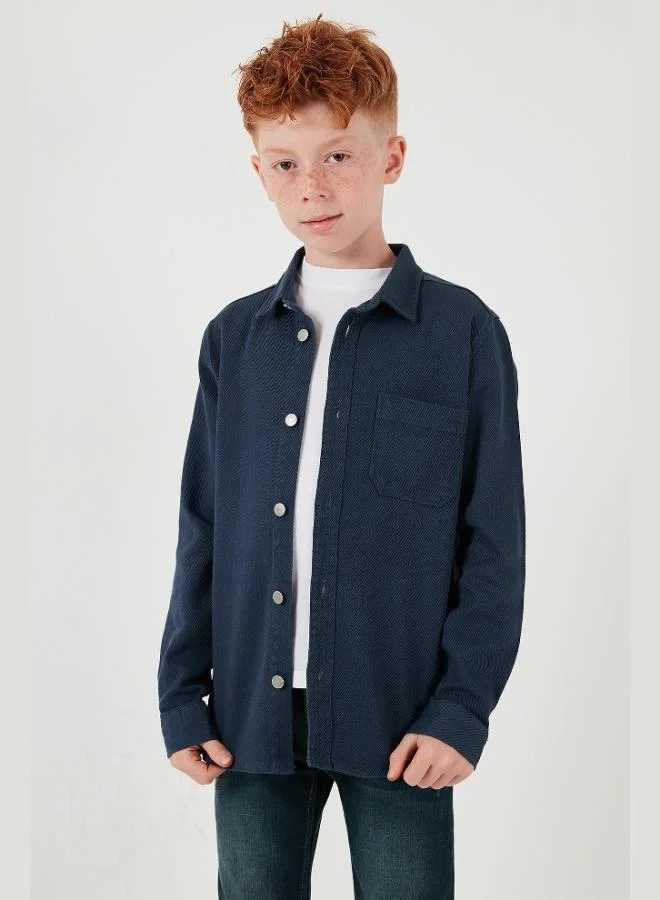 ليلا قميص قطني بياقة سادة وجيب واحد للأولاد