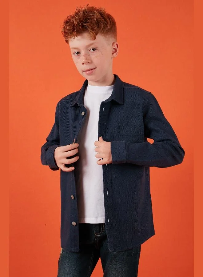 ليلا قميص قطني بياقة سادة وجيب واحد للأولاد