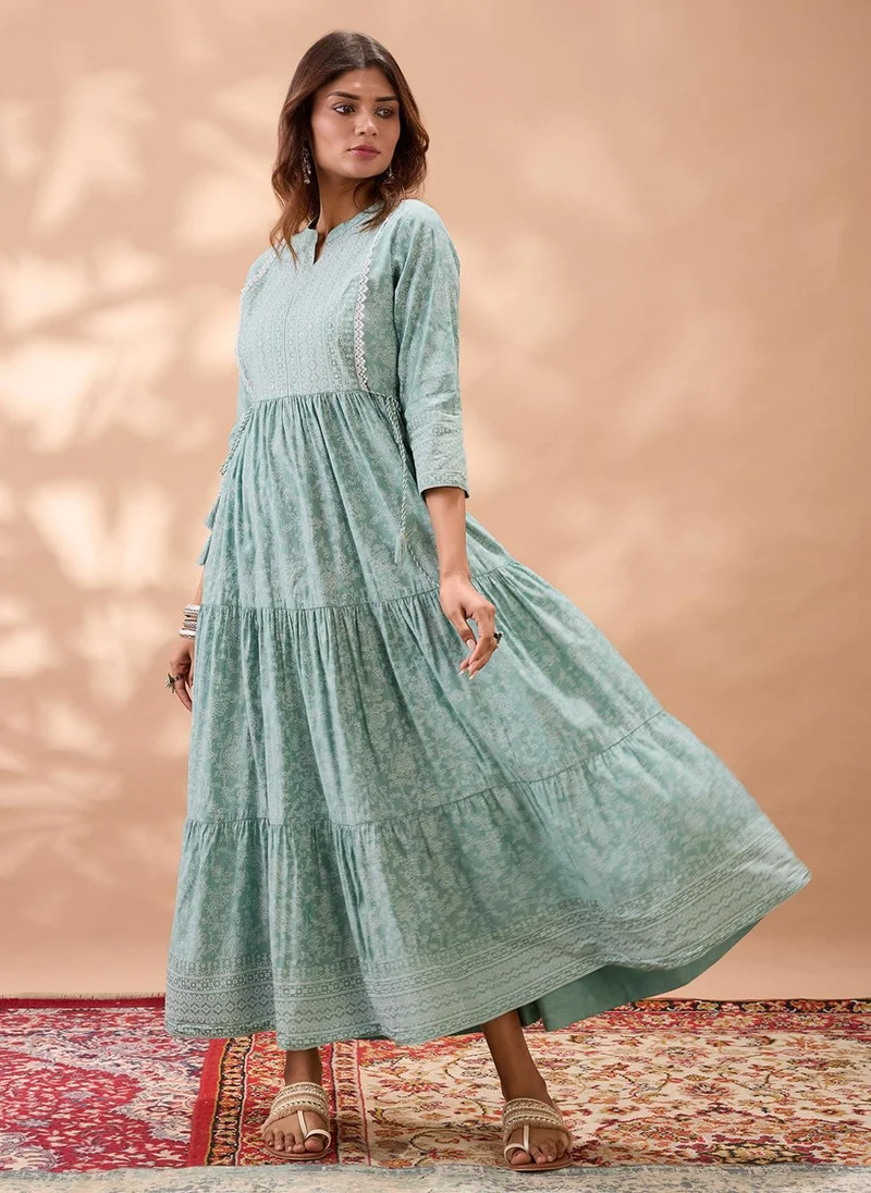 globus Globus Women Green Mandarin Collar Floral Print Fit and Flare Lace & Tie Up Detail Flared Hem Tiered Maxi Dress