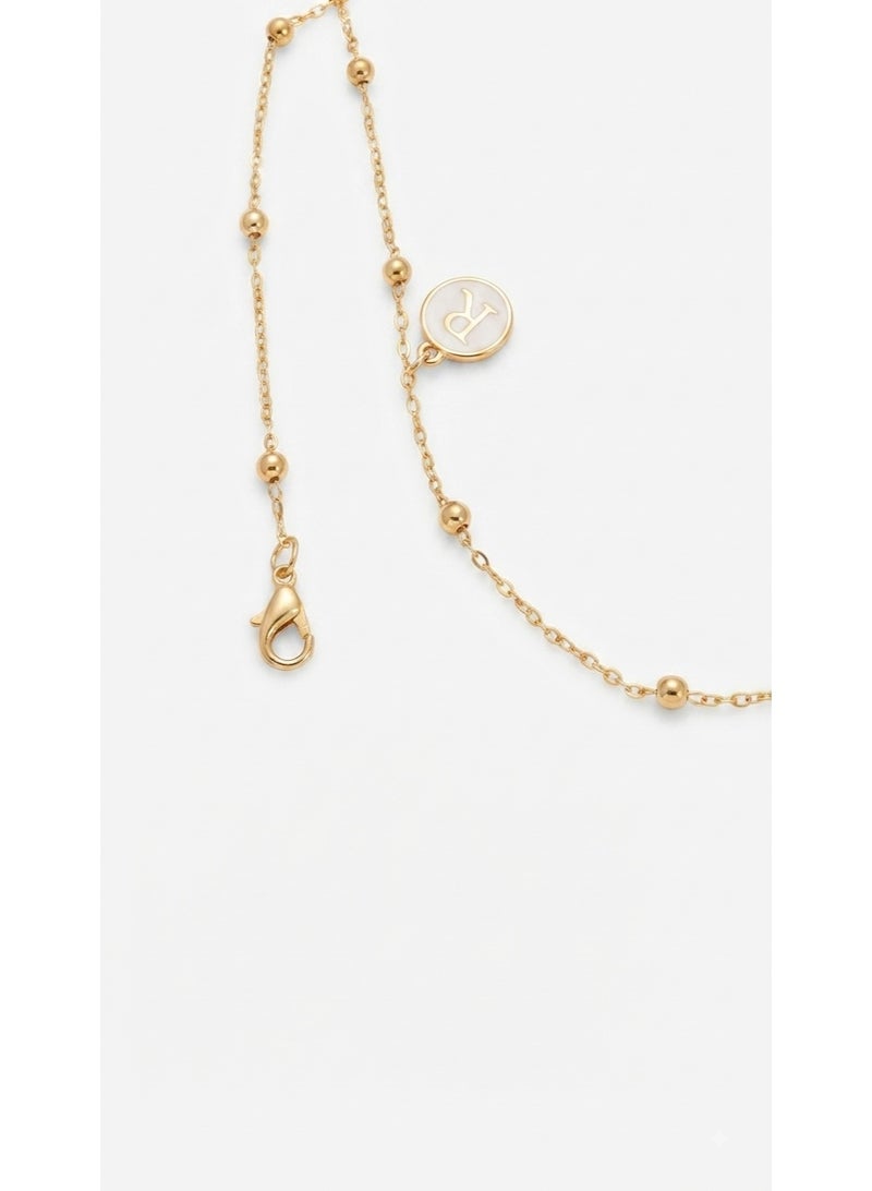 Women's waist chain featuring circular 'R' letter pendants; a belly and body accessory - Image 3