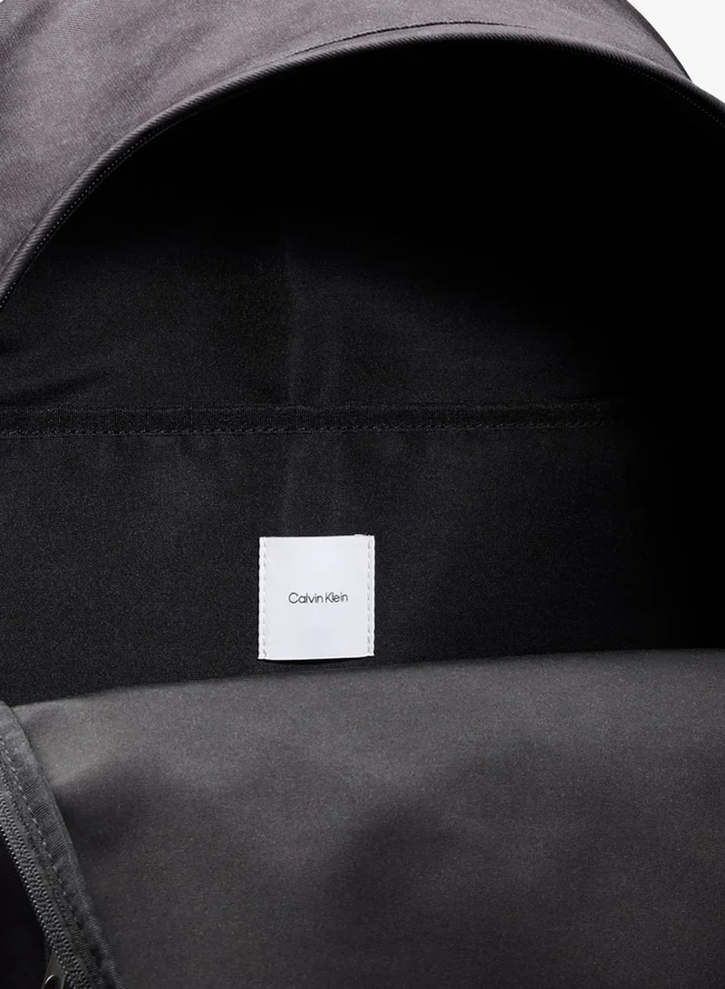 Calvin Klein  Logo Graphic Textile Dome Backpack for Men | Best Price UAE