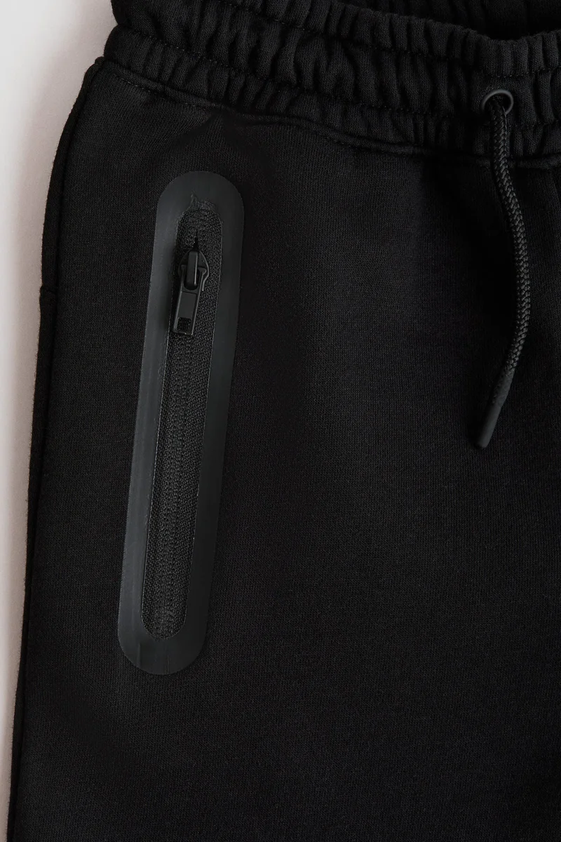 اتش اند ام شورت رياضي بطول الركبة