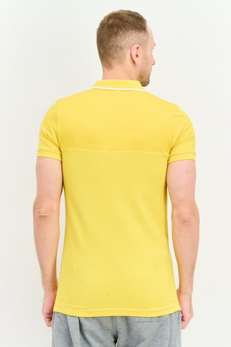 PUMA قميص بولو خارجي للرجال بقصة ضيقة بأكمام قصيرة، أصفر - Image 3
