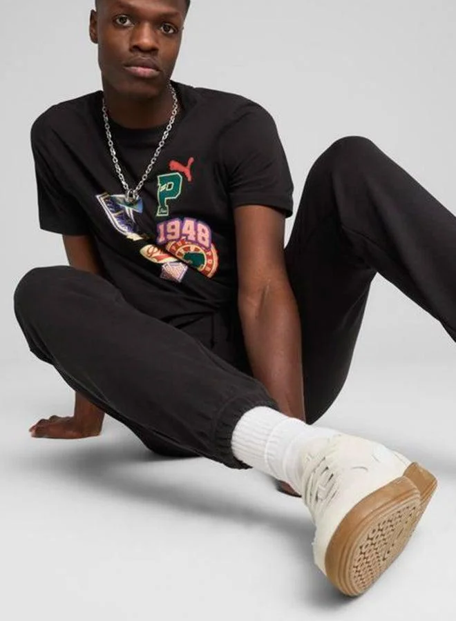PUMA black Legacy Graphic Sweatpants for Men | Best Price UAE