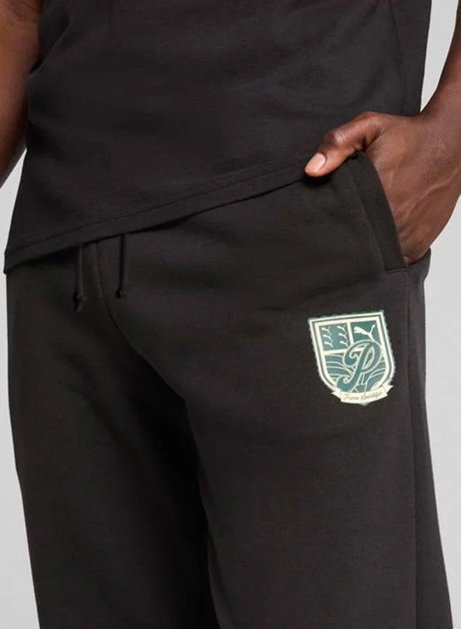 PUMA black Legacy Graphic Sweatpants for Men | Best Price UAE