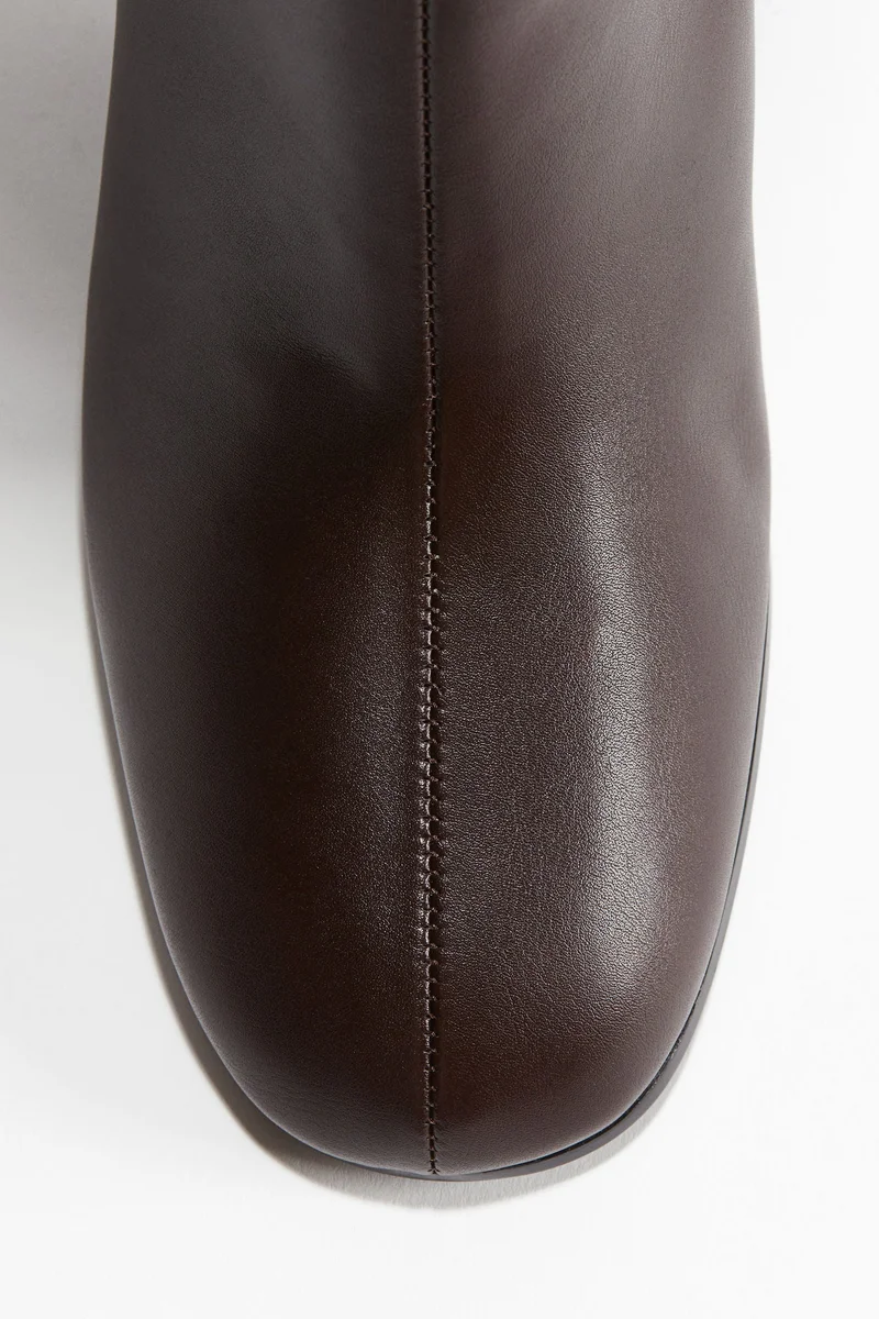 اتش اند ام بووت بكعب وبطول يصل للركبة