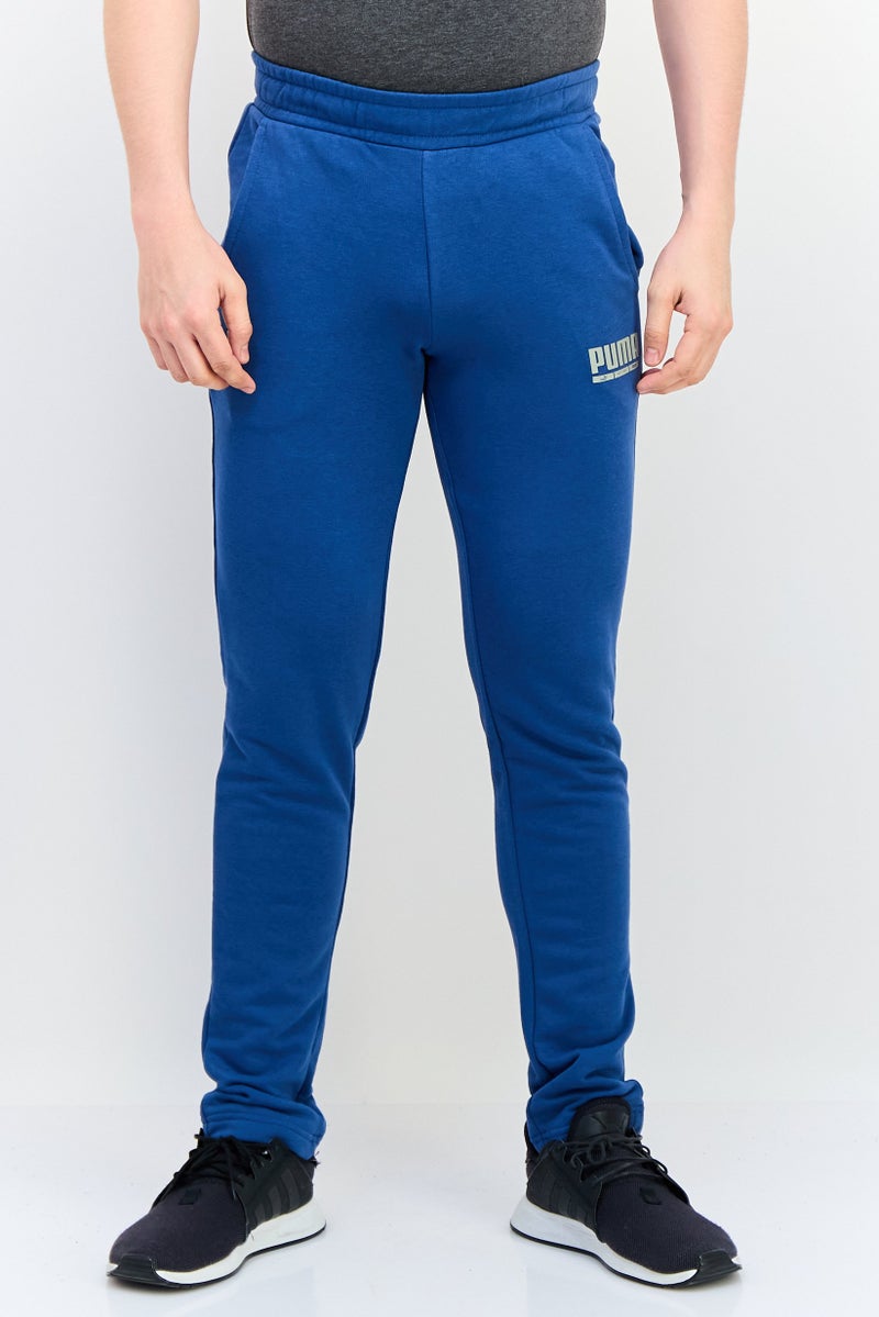 PUMA سروال رياضي للرجال مناسب في الهواء الطلق، أزرق - Image 1