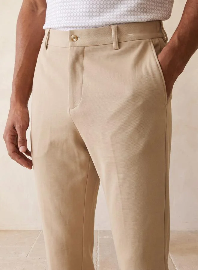 Iconic BEIGE Iconic Regular Fit Trousers for Men | Best Price UAE