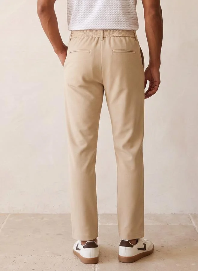 Iconic BEIGE Iconic Regular Fit Trousers for Men | Best Price UAE