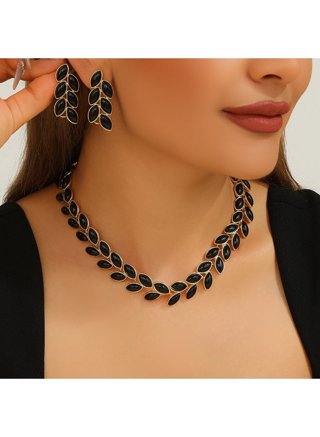 Vintage Gold Tone Black Leaf Necklace & Earrings Jewelry Set - Image 1