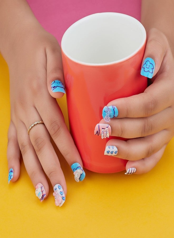 شيري بوكس مجموعة أظافر كرتونية ثلاثية الأبعاد جميلة ولطيفة من CherryBox، مكونة من 12 قطعة للأطفال والكبار، بتصميم كرتوني كاواي مصنوع من الراتنج (لون أزرق مع لمسة وردية وكريمية). - Image 2