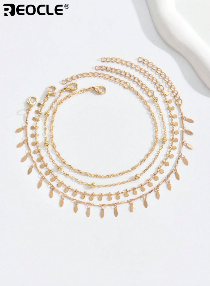 REOCLE 4PCS Women's Foot Chain Multi-Layered Anklet Set with Dangling Charms Gold-Tone Foot Chain Fashion Accessory for Daily Styling Beach Looks and Special Occasions - Image 4