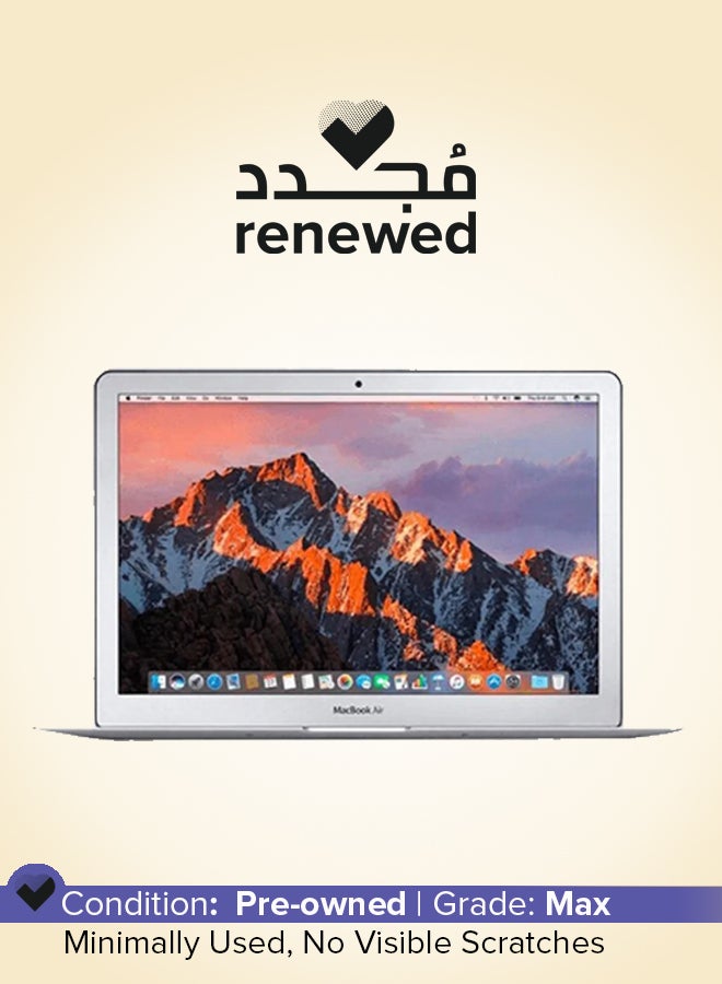 ابل  تم تجديده - كمبيوتر محمول ماك بوك إير A1466 (2017) بشاشة مقاس 13.3 بوصة ومعالج إنتل كور i7/الجيل السابع وذاكرة الوصول العشوائي سعة 8 جيجابايت ومحرك أقراص SSD سعة 256 جيجابايت وبطاقة رسومات مدمجة سعة 1.5 جيجابايت باللغة الإنجليزية فضي - Image 1