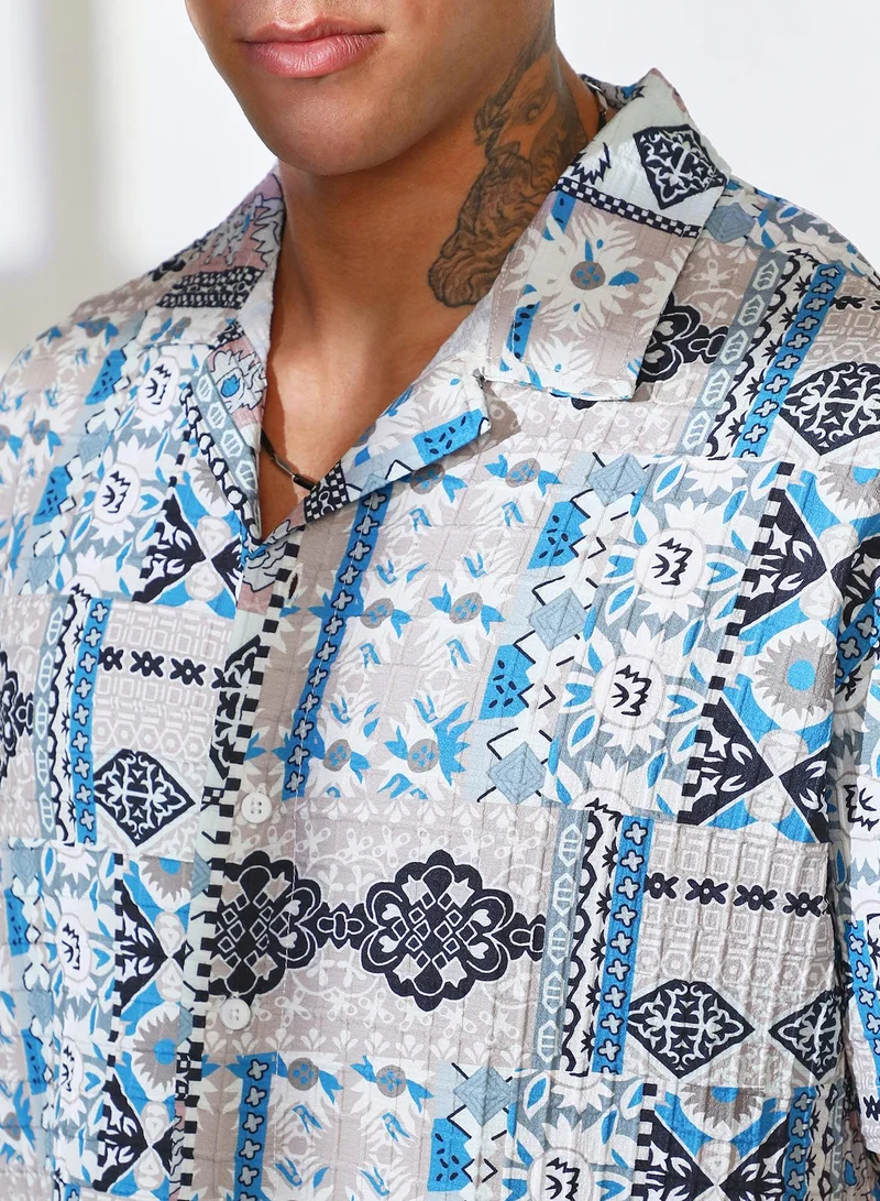 Campus Sutra Campus Sutra Men's Sky Blue & Cloud Grey Bohemian Impressions Oversized Shirt For Casual Wear | Cuban Collar | Short Sleeve | Button Closure | Oversized Shirt Crafted With Comfort Fit For Everyday Wear