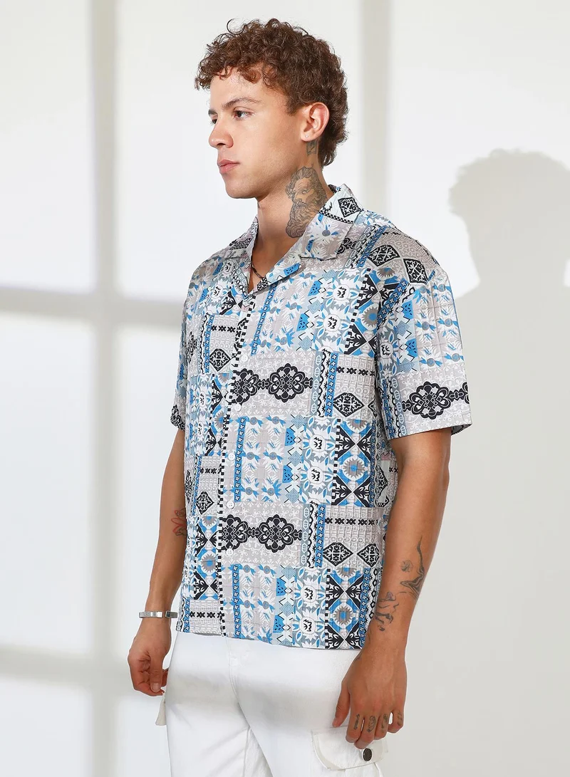 Campus Sutra Campus Sutra Men's Sky Blue & Cloud Grey Bohemian Impressions Oversized Shirt For Casual Wear | Cuban Collar | Short Sleeve | Button Closure | Oversized Shirt Crafted With Comfort Fit For Everyday Wear