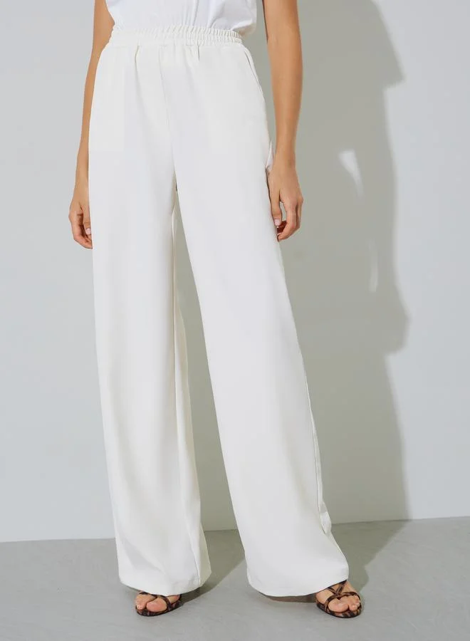 ستايلي Beige Solid Wide Leg Pants