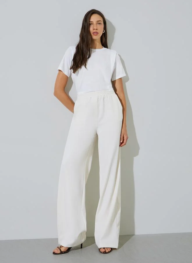 ستايلي Beige Solid Wide Leg Pants
