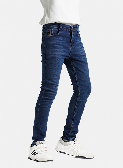 بنطال جينز ضيق بليكرا للولاد ازرق داكن