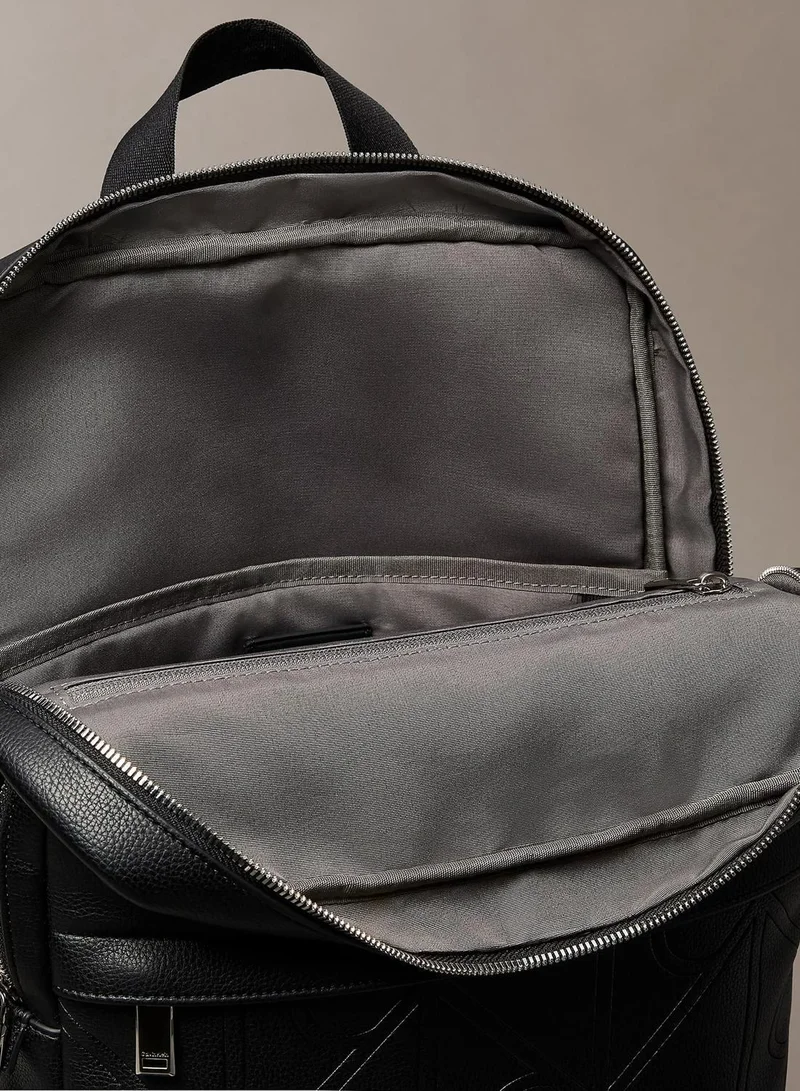 Calvin Klein Black Allover Embossed Emblem Logo Round Backpack for Men | Best Price UAE