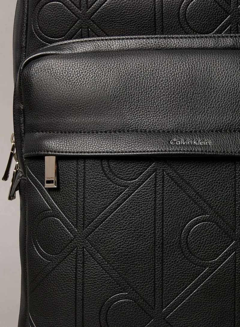 Calvin Klein Black Allover Embossed Emblem Logo Round Backpack for Men | Best Price UAE