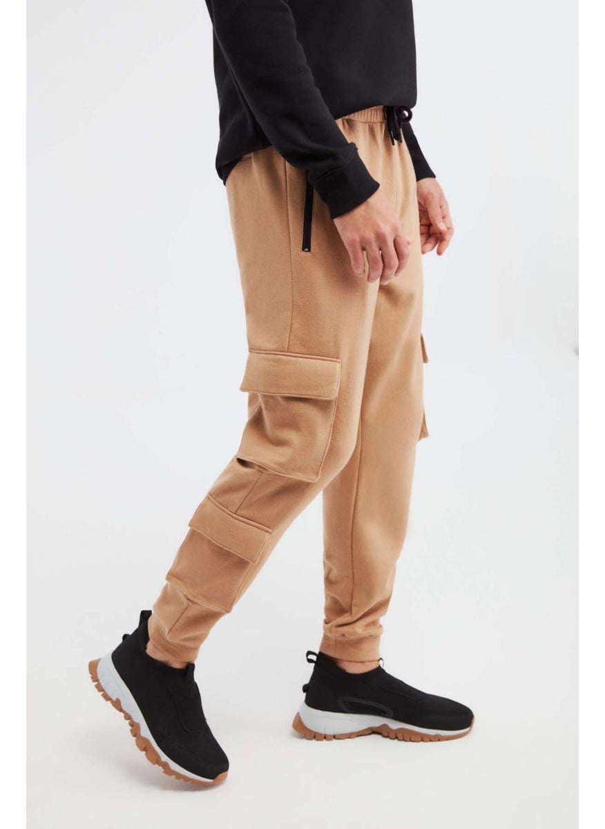 Volume Comfort Brown Sweatpants - pzsku/Z7AA2915DA059CD0CA7E2Z/45/_/1741213005/1e8f0bdb-e691-42e0-9b78-20fa1d441ef1