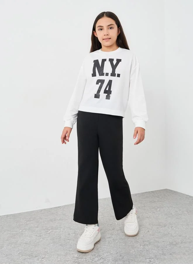 Styli Styli Teen Graphic Sweatshirt and Flare Pants Set