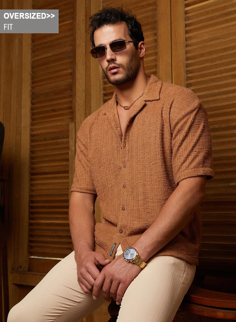 Campus Sutra Campus Sutra Men's Tan Brown Tactile-Resort Oversized Shirt For Casual Wear | Cuban Collar | Short Regular Sleeves | Button Closure | Oversized Shirt Crafted With Comfort Fit For Everyday Wear