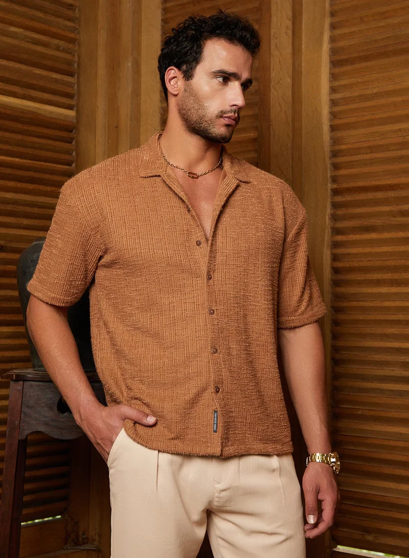Campus Sutra Campus Sutra Men's Tan Brown Tactile-Resort Oversized Shirt For Casual Wear | Cuban Collar | Short Regular Sleeves | Button Closure | Oversized Shirt Crafted With Comfort Fit For Everyday Wear