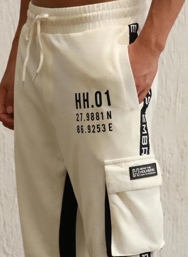 Hubberholme Regular Fit Contrast Panel Printed Joggers by Styli