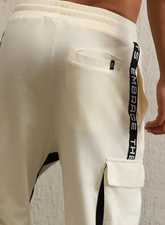 Hubberholme Regular Fit Contrast Panel Printed Joggers by Styli