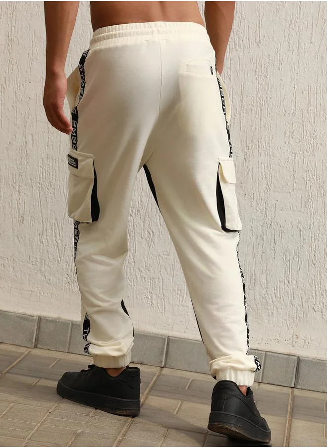 Hubberholme Regular Fit Contrast Panel Printed Joggers by Styli