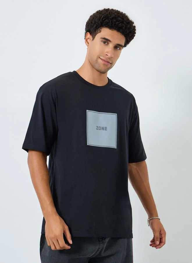 Styli Men Black Graphic Print Oversized T-Shirt