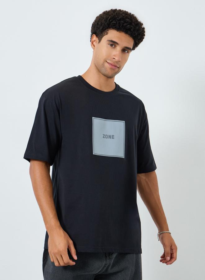 Styli Men Black Graphic Print Oversized T-Shirt - Image 1