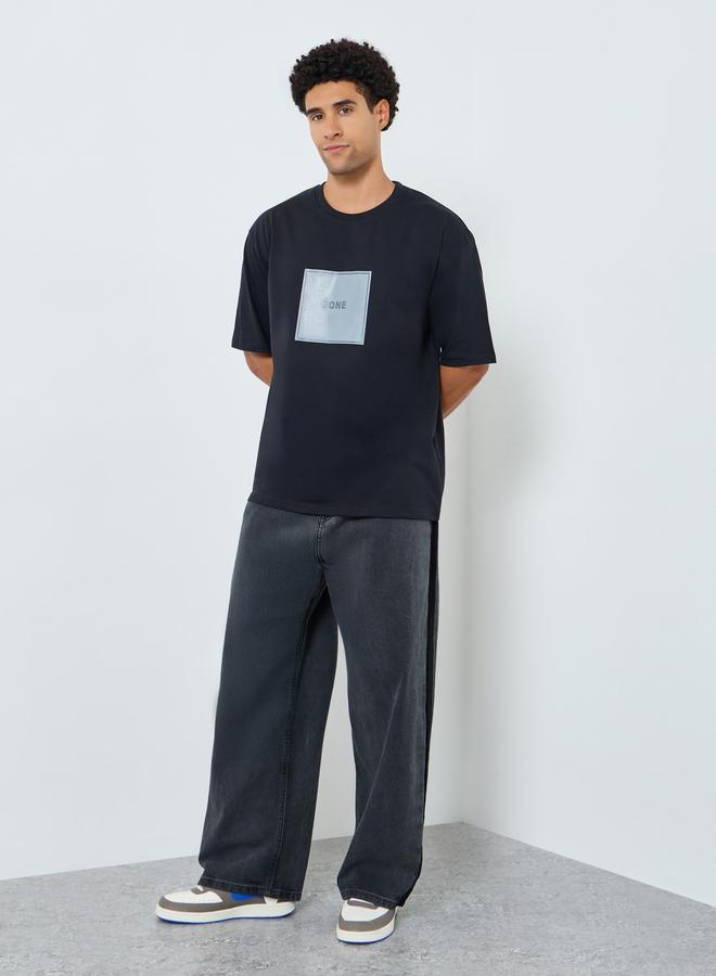 Styli Men Black Graphic Print Oversized T-Shirt - Image 2