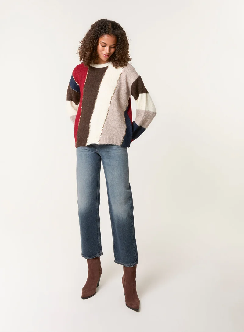 بلو فانيلا كنزة مخططة بتفاصيل ترتر