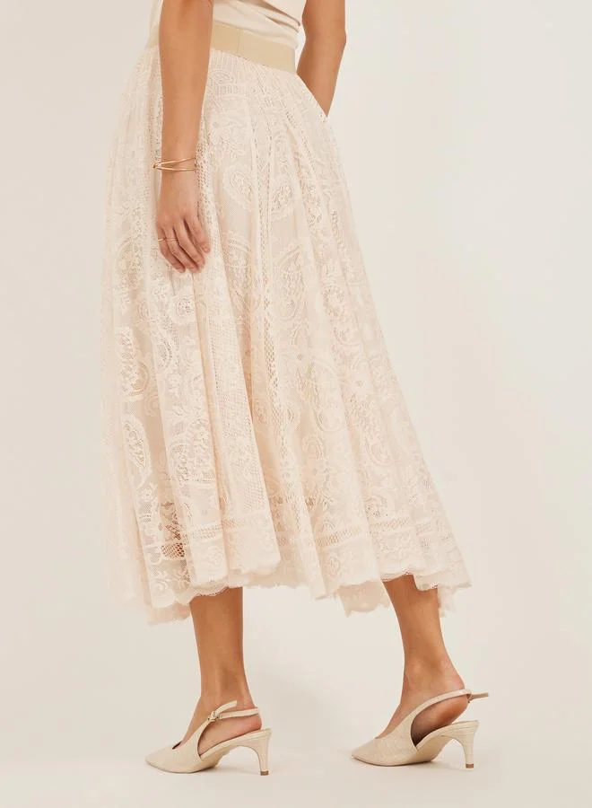 Styli Styli Solid Asymmetric Hem Lace A-Line Midi Skirt