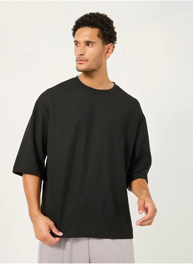 Styli Textured Stretch 3/4th Sleeves Oversized T-Shirt