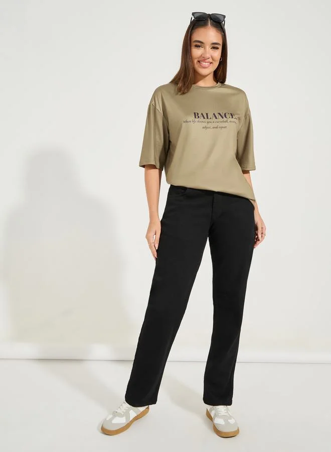 Styli Oversized Balance Slogan T-Shirt with Dropped Shoulder