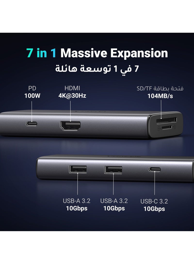 موزع تايب سي USB 7 في 1 يوفر لك سرعة نقل بيانات فائقة مع تصميم عصري يناسب جميع احتياجاتك بسرعة 10 جيجا بايت في الثانية نقل البيانات + بقوة 100 وات وشحن سريع + منفذ HDMI عالي الدقة 4K + قارئان للبطاقات - Image 1
