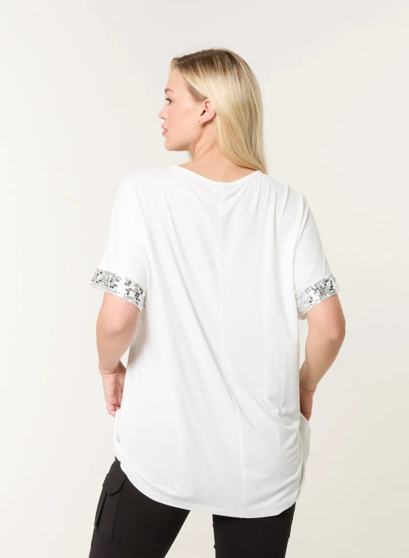 بلو فانيلا بلوزة واسعة مزينة بالترتر