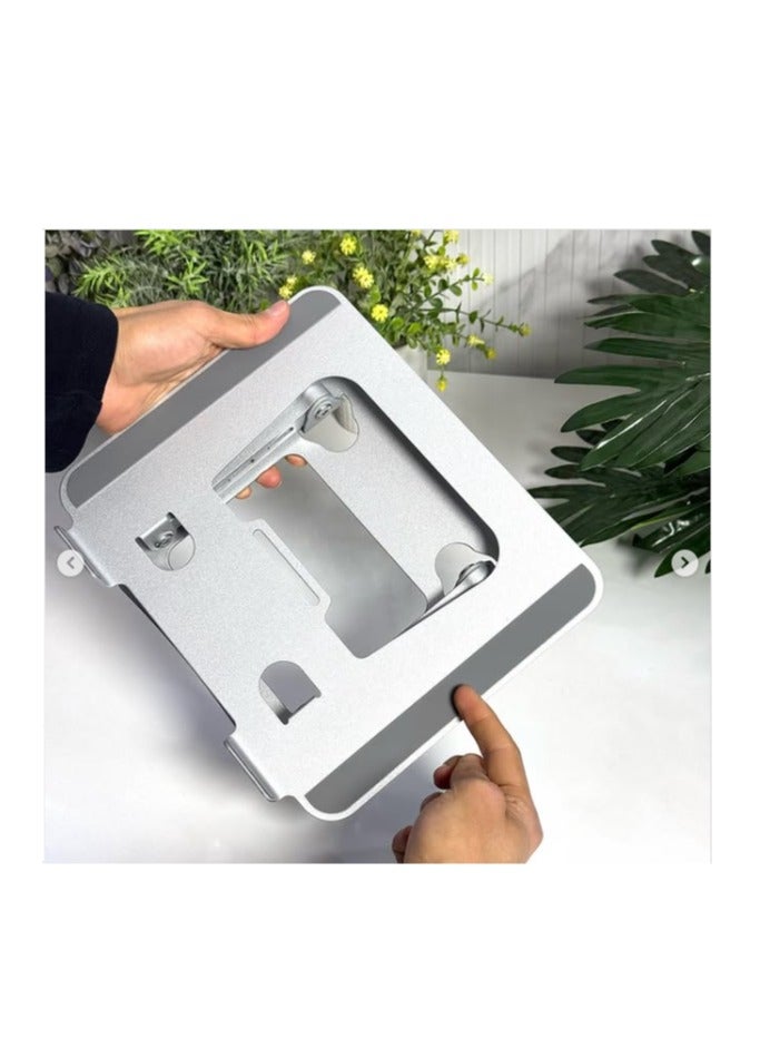 🔥 ستقف اللابتوب والآيباد العملاق – كل ما تسعى إليه هو حامل واحد! • 🏗️ متين وقوي – مصنوع من الكربون المقاوم للصدأ • 🛋️ يستخدم في أي مكان – Bebe Bebe، على الاختفاء، أو بأي مكان يناسبك • 🔄 قابل لتعديل الارتفاع – راحة دائمة لأي وضعية جلوس • 🔒 وسائد سيليكون مقاومة للانزلاق – حماية تامة لك • 💻 متوافق مع جميع اللابتوبات – من 10 إلى 17 إنج - Image 4