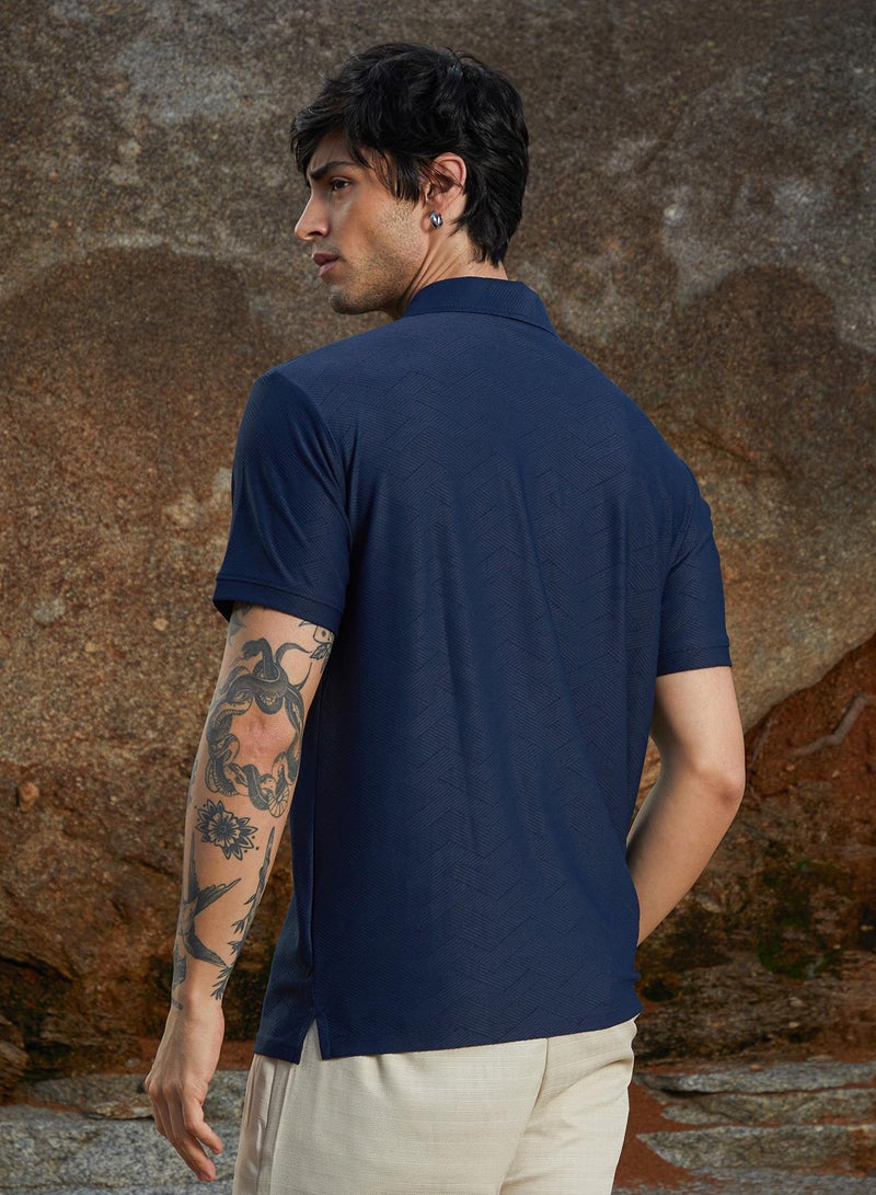 Campus Sutra Campus Sutra Men's Indigo Blue Basket-Textured Polo T-Shirt For Casual Wear | Polo Neck | Short Sleeve | Half-Button Closure | Oversized Shirt Crafted With Comfort Fit For Everyday Wear  - Image 3