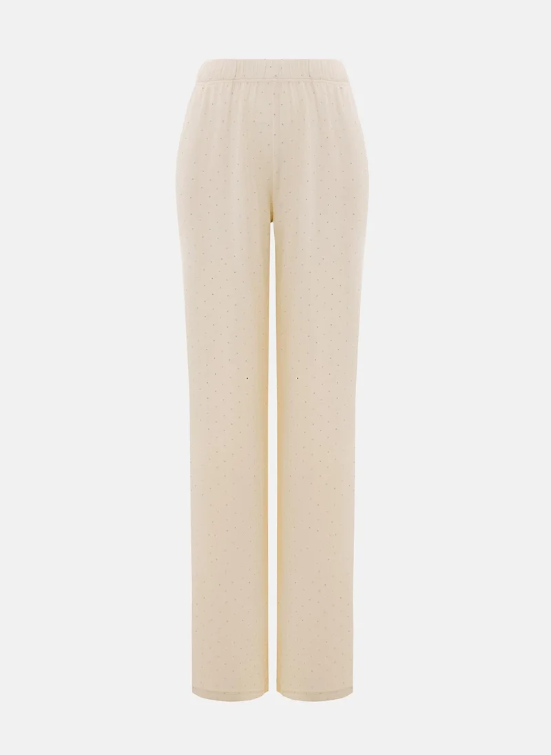 ليتشي بنطال جيرسي مرصع بأحجار الراين