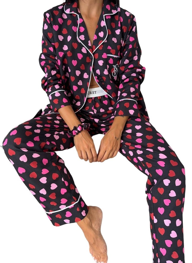 Victoria Secret Pink Victoria Secret Silk Satin a dark purple/burgundy pajama set with a heart pattern - Image 1