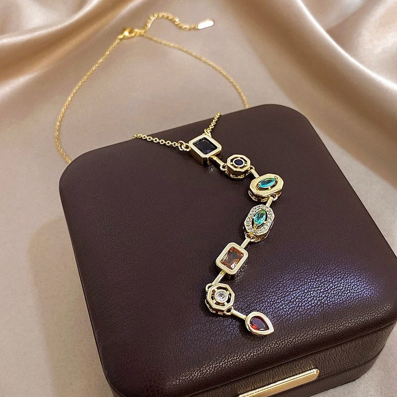 سلسلة أستانليس ستيل ذهبي مرصعة بفصوص الزيركون متعددة الألوان - Image 2