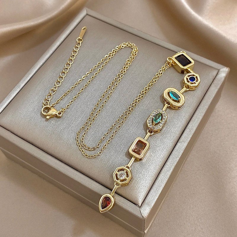 سلسلة أستانليس ستيل ذهبي مرصعة بفصوص الزيركون متعددة الألوان - Image 5